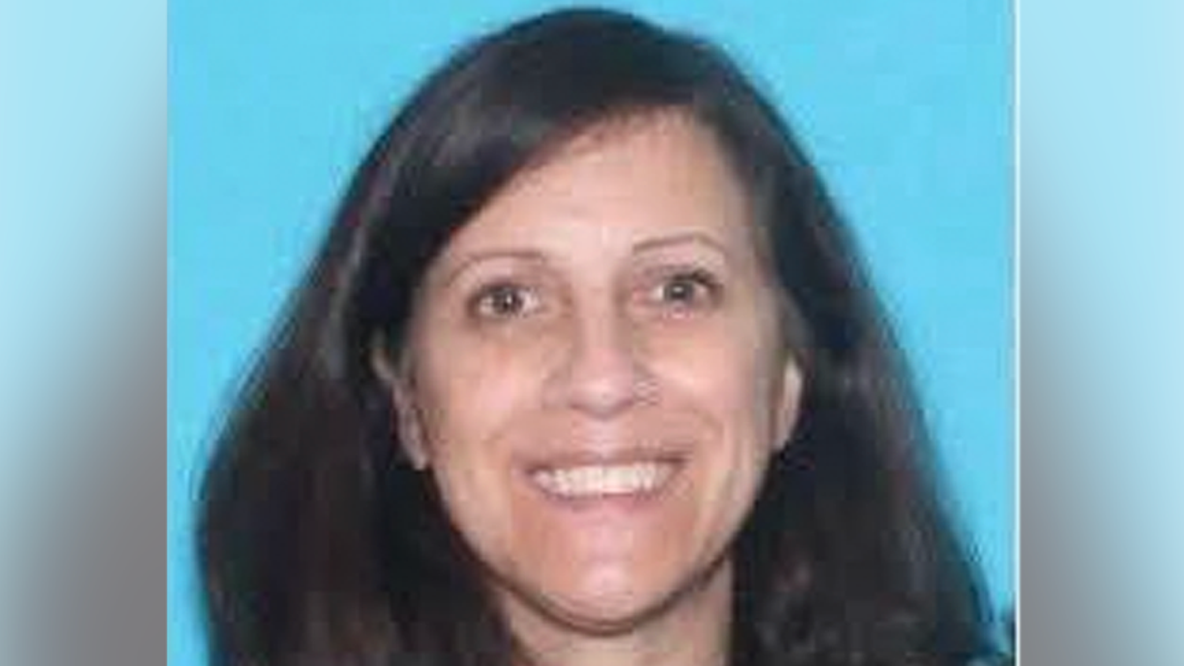 Manhunt expands for armed woman after Massachusetts police officer found dead