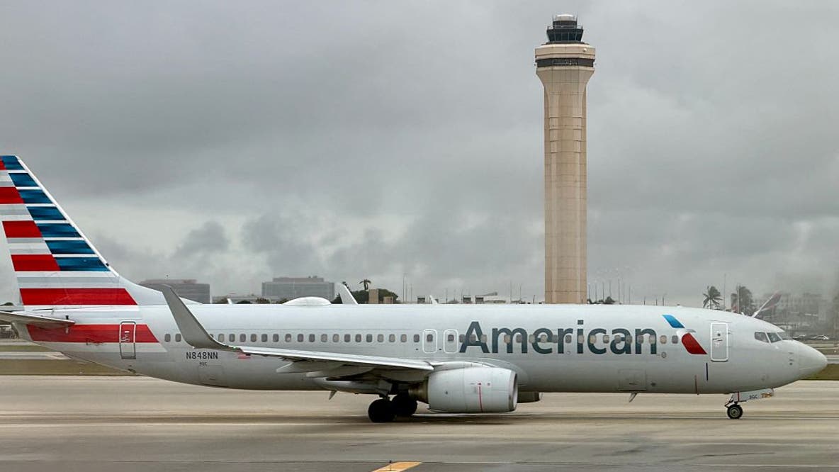 American Airlines passenger accused of undressing, behaving indecently
