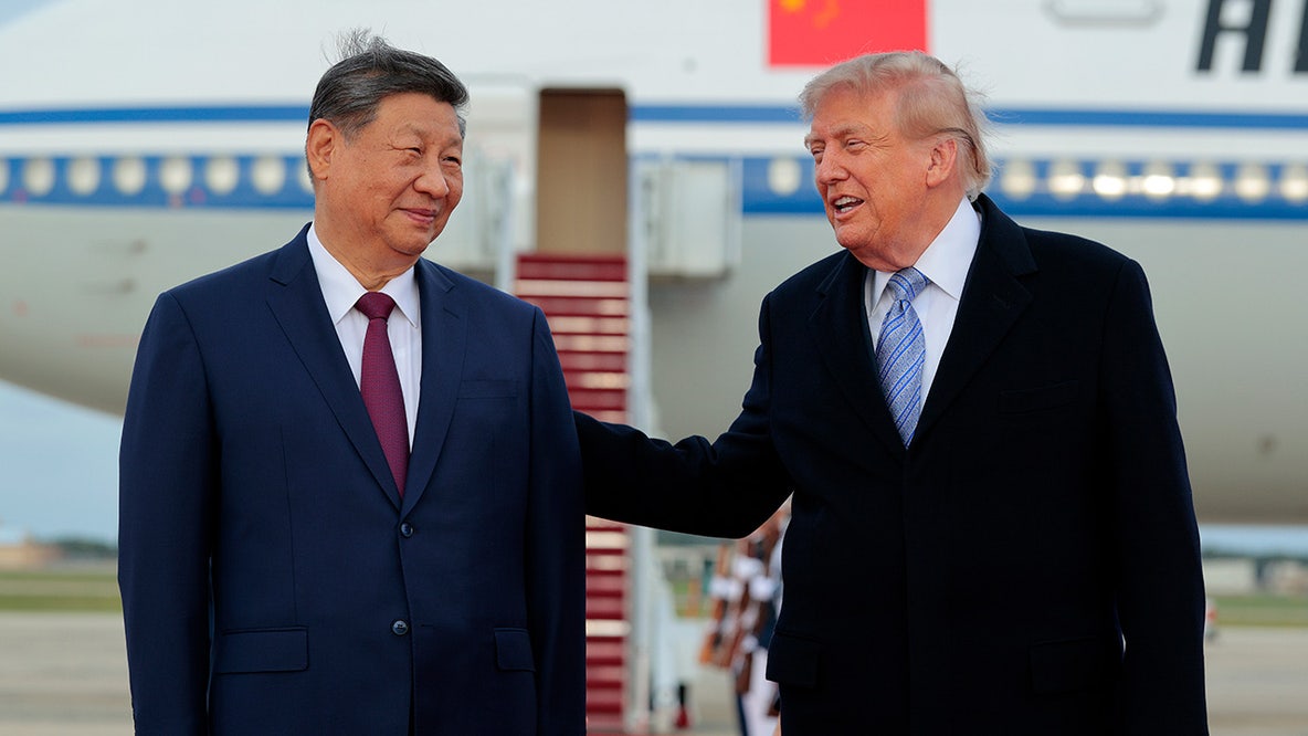 Trump welcomes China’s Xi with rare planeside greeting ahead of talks