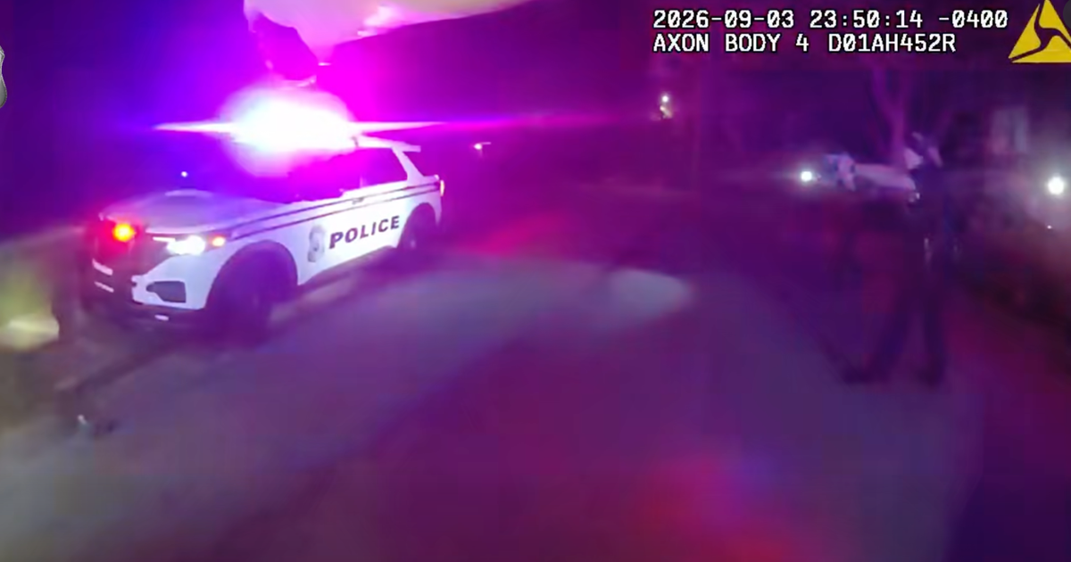 Watch: Homicide suspect steals police car, crashes through Ohio home