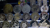 Swerving van leads police to $2.65 million in stolen US silver coins