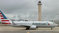 American Airlines passenger accused of undressing, behaving indecently