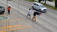 Watch: Supermarket manager races to save child from traffic