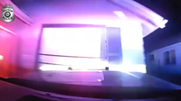 Watch: Suspect steals police cruiser, crashes into Ohio home