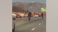 Watch: Motorcyclist crashes doing wheelie on interstate