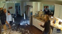 Watch: Homeowners get a shock when man falls through ceiling