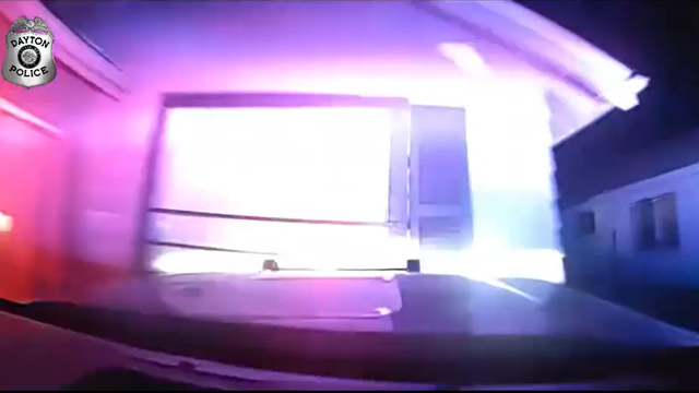 Watch: Suspect steals police cruiser, crashes into Ohio home