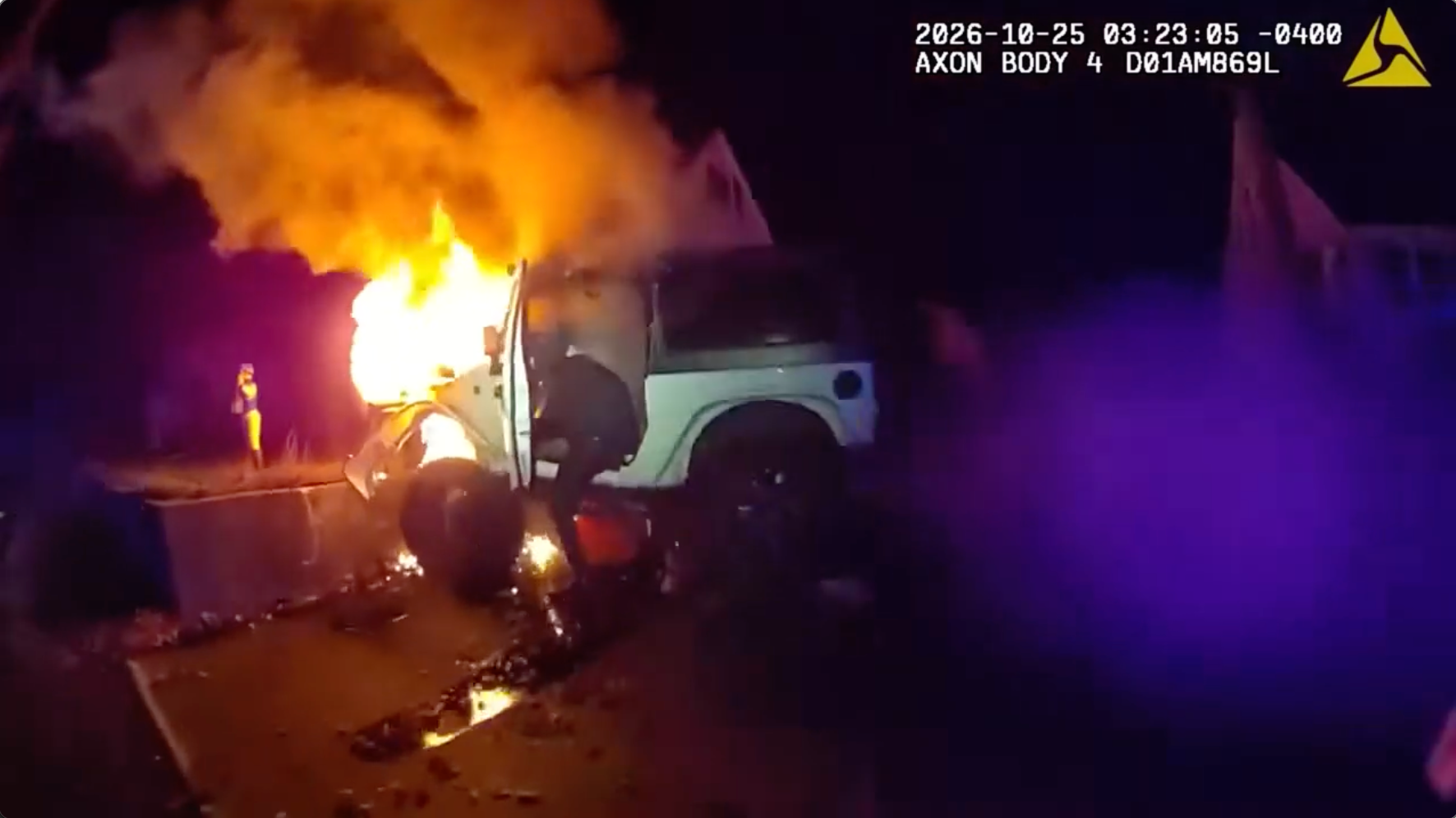 Bodycam video shows police rescuing man from burning Jeep after crash; driver facing multiple charges