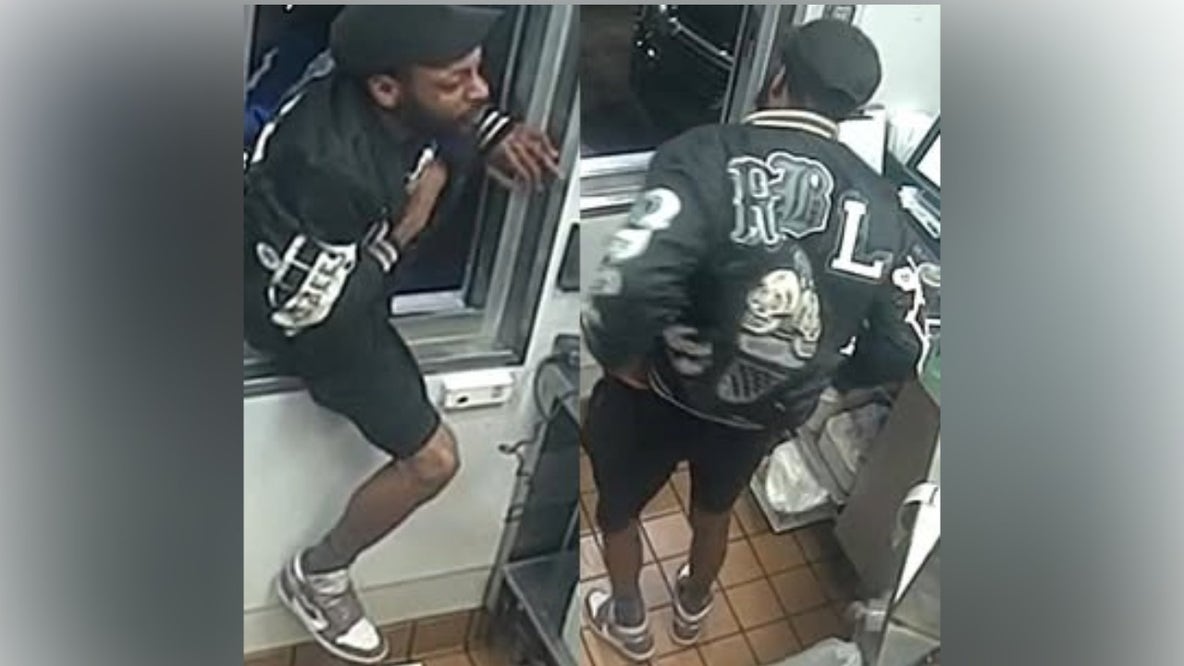 Watch: Fast food robbery suspect climbs through drive-thru window