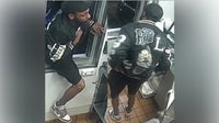 Watch: Fast food robbery suspect climbs through drive-thru window