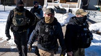 DOJ sues Denver over ordinance banning masks for federal law enforcement officers