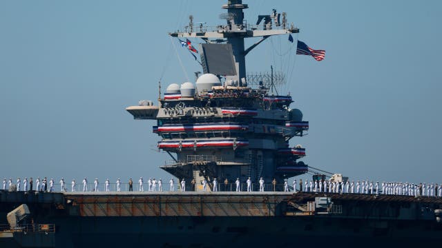 USS Abraham Lincoln returns to home port after near-record deployment