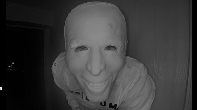 Bizarre doorbell video shows random person eating banana through Joe Biden mask