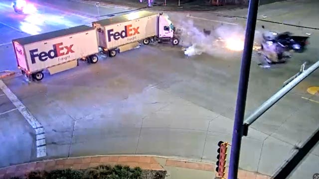 Watch: Suspect fleeing from police crashes into FedEx semi-truck