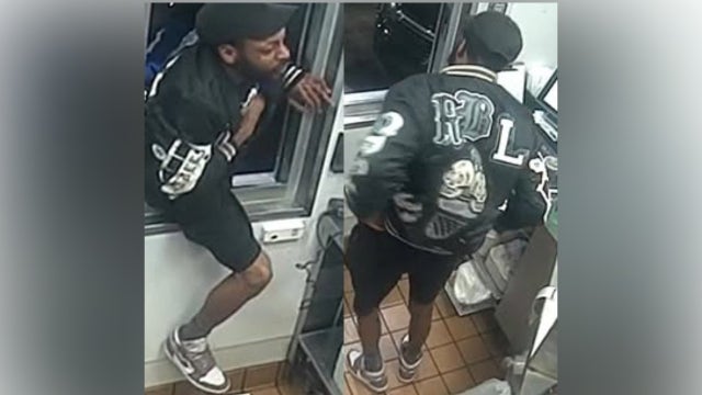 Watch: Fast food robbery suspect climbs through drive-thru window