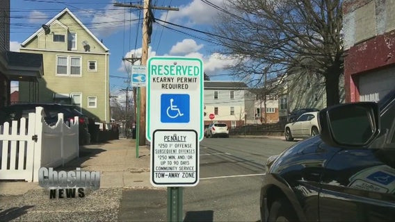 Town considers forcing handicapped drivers to use designated spots