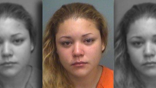 Woman accused of fatally shooting fiancé's dog after man reportedly refused to crack her back