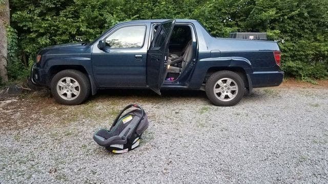 1-year-old girl dies after adoptive father forgets her 'all day' in truck, police say