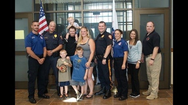 Quick police, paramedic, family response save young boy's life