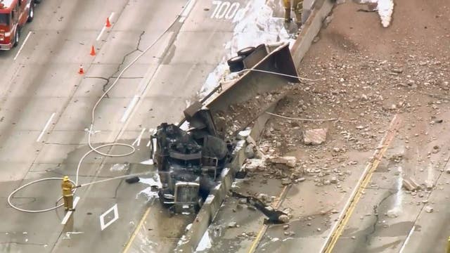 Three people hurt after fiery big rig crash on 405 Freeway in Sepulveda Pass