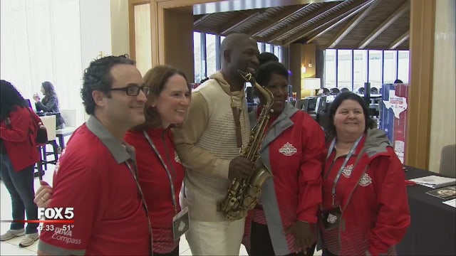 Saxophone player who rocked the Georgia Dome visits Houston