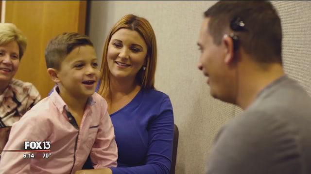 Largo man hears son for first time after cochlear implant surgery