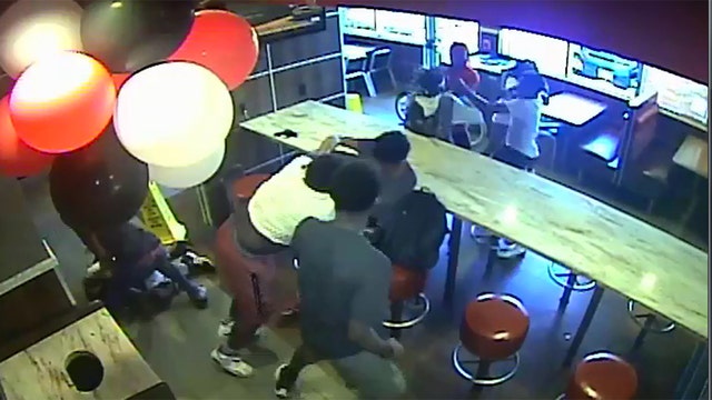 Hunt for suspects in Burger King beat-down