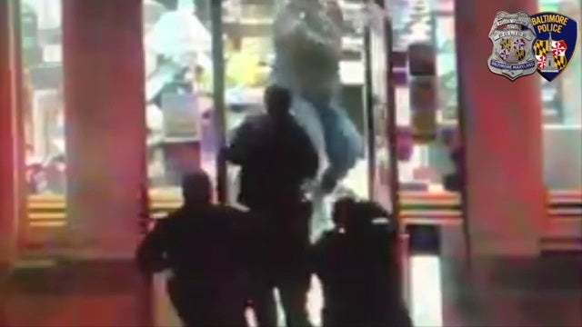 VIDEO: Baltimore police exchange gunfire with robbery suspects