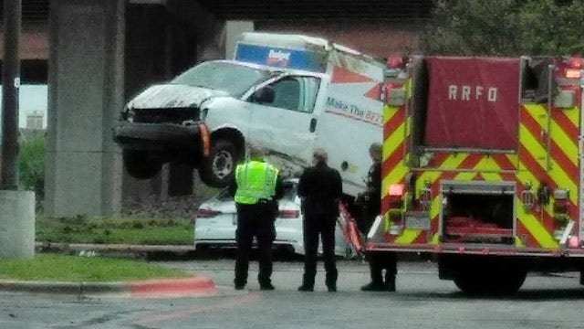 Budget truck jumps curb, lands on Audi in Round Rock