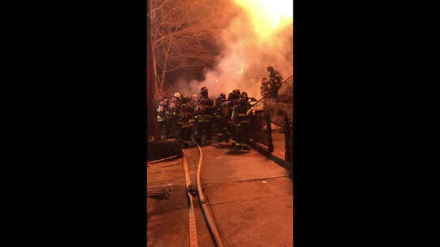 VIDEO: Flaming debris lands on firefighters