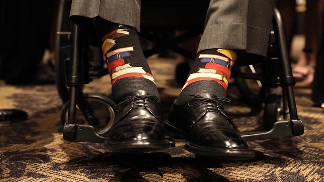 George H.W. Bush honors wife's life commitment to literacy with books on his socks
