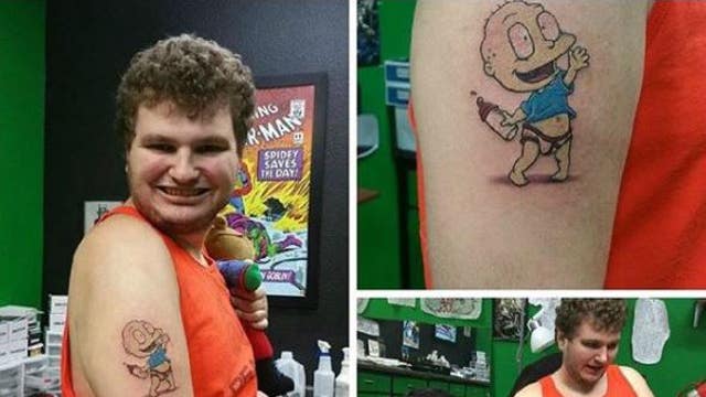 Man who was diagnosed with autism thrilled to finally get tattoo