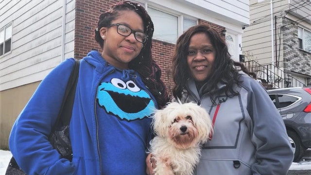 Girl walking dog finds man tied up in car trunk