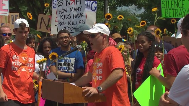 Protesters, Florida school shooting survivors hold 'National March on NRA' rally