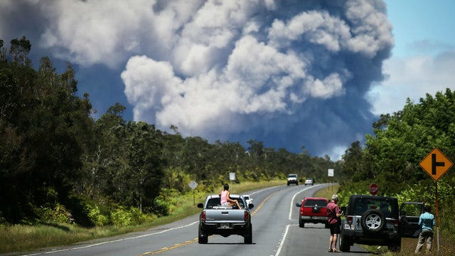 Hawaii volcano erupts from summit, sends huge plume into sky