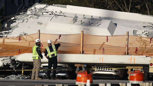Tearful families wait as bodies remain under failed bridge