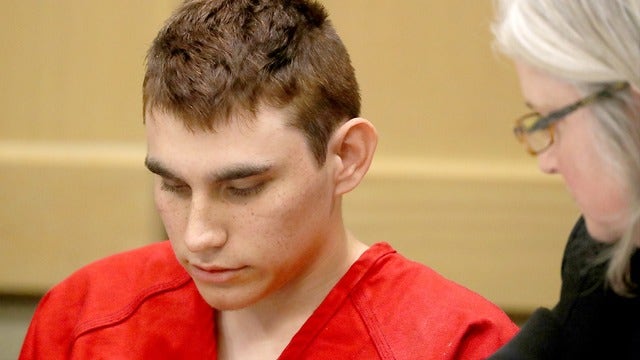 The Latest: Not guilty plea for school shooting suspect