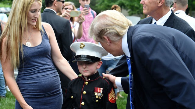 Trump honors wife and 7-year-old son of fallen Marine