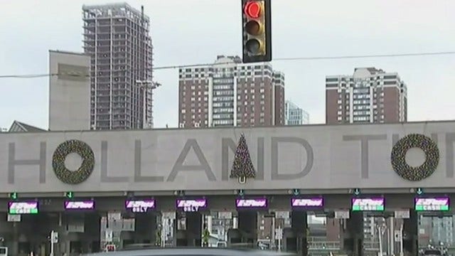 Christmas decorations moved on Holland Tunnel sign