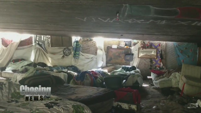 Trash-filled encampments line New Jersey river