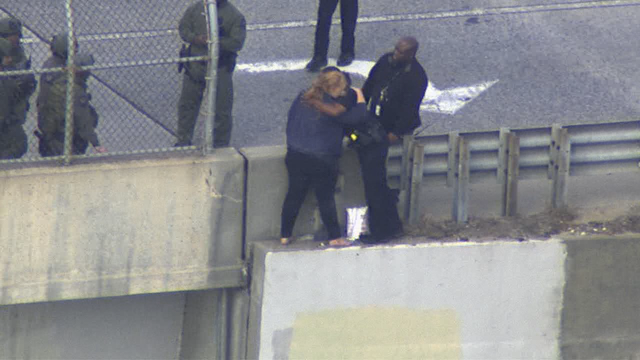 First responders save woman from jumping off I-20 overpass