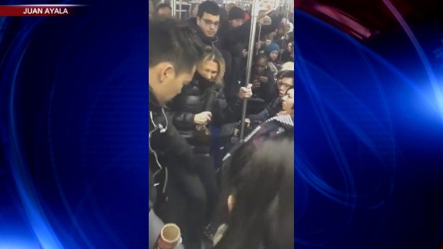 Woman on subway attacks rider with an umbrella