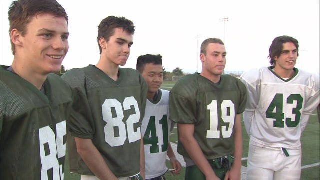 Lake Orion football players pay forward stranger's kindness