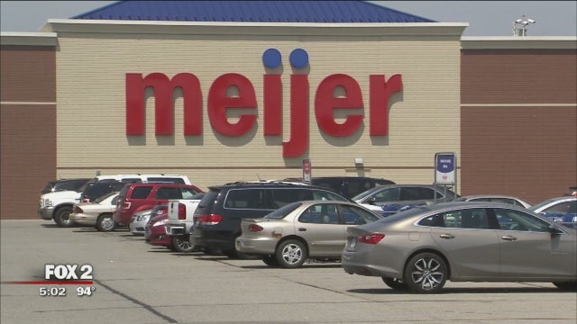 Mom arrested after 3 kids left in hot car in Meijer parking lot