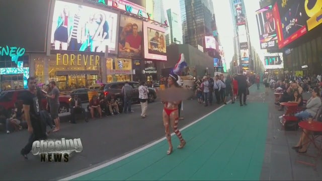 Topless women back in Times Square