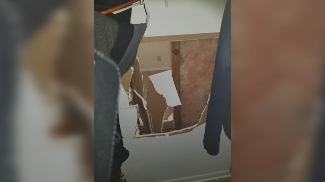 Victim says thief broke into apartment through closet wall