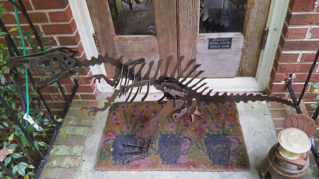 Candler Park family's dinosaur sculpture stolen