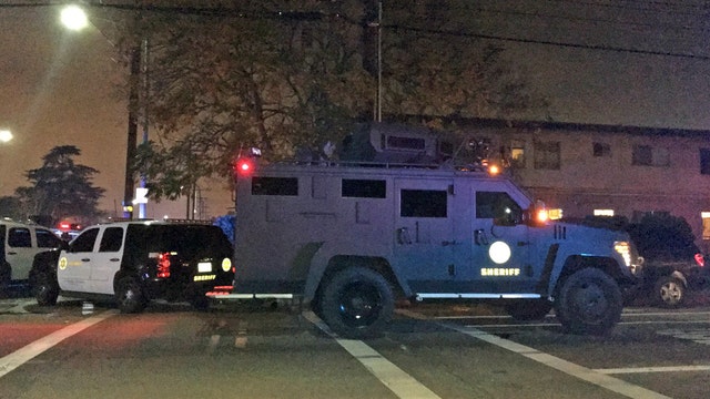2 California officers shot, 1 killed in 15-hour standoff with suspect
