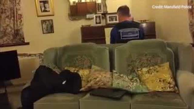 Police officer plays piano for elderly man during welfare check