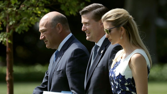 Kelly in harsh spotlight after White House senior aide's resignation